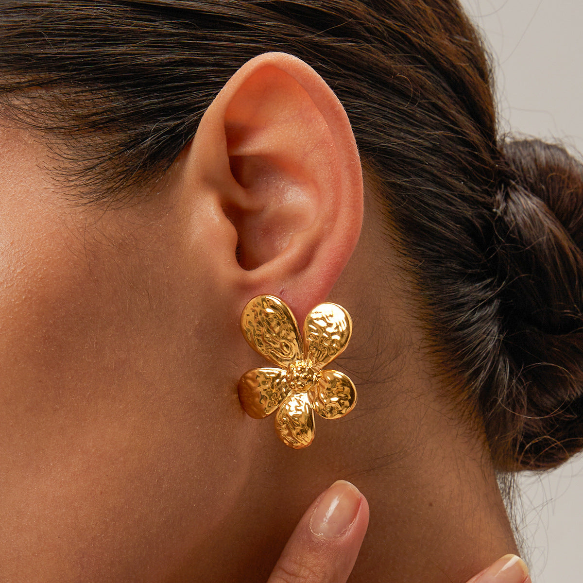 Trend Alert: The Elegance of Golden Textured Flower Stud Earrings